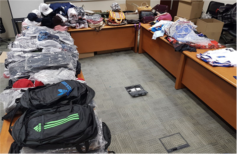 20170825_FOUR_ARRESTED_FOR_SALE_OF_COUNTERFEIT_LUXURY_AND_SPORTS_ITEMS_cid6