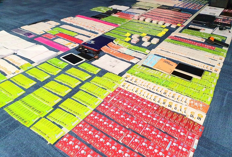 20220116_34_persons_under_inv_for_fraudulently_reg_prepaid_sim_cards_in_island-wide_op_4