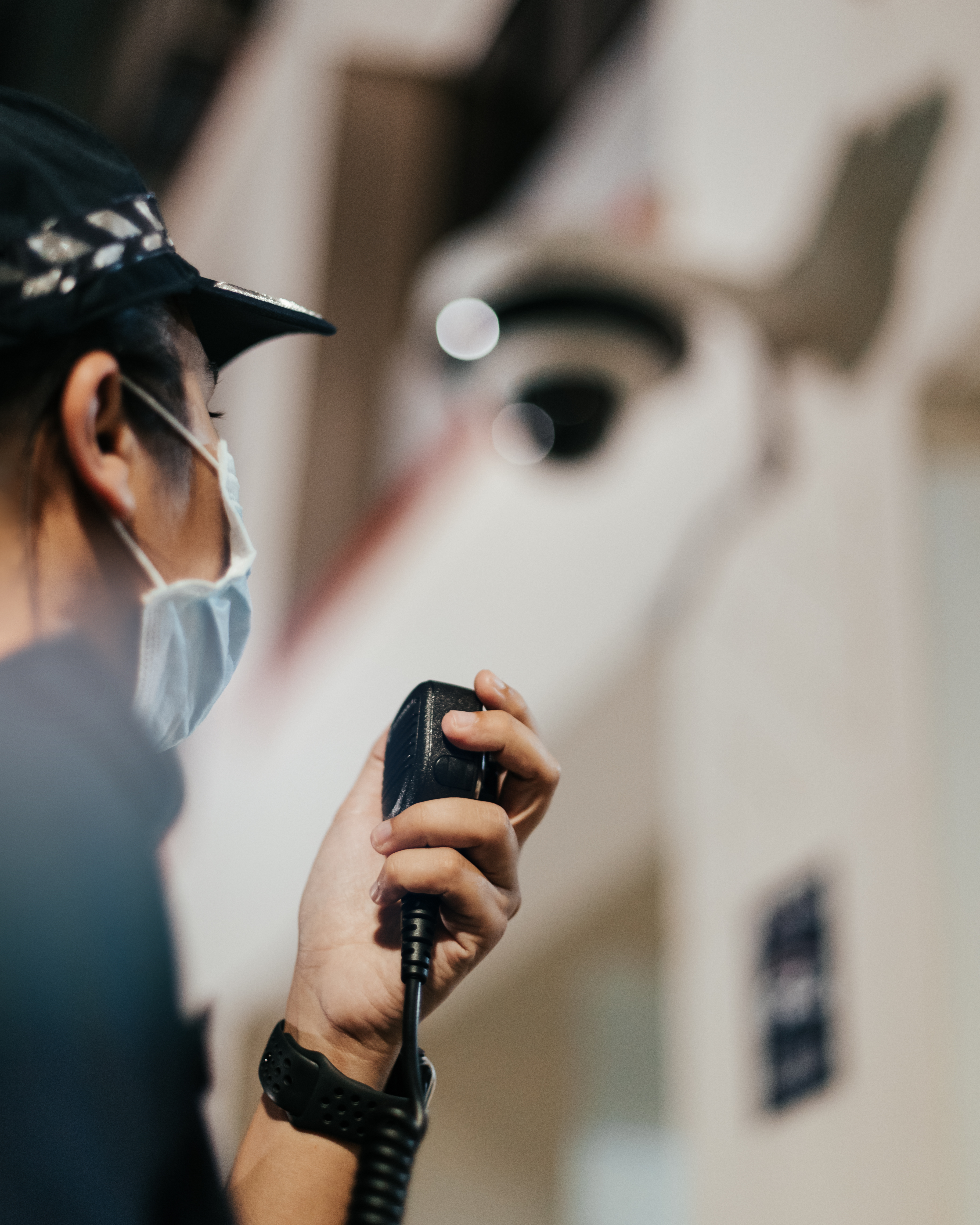 police officer using radio comms