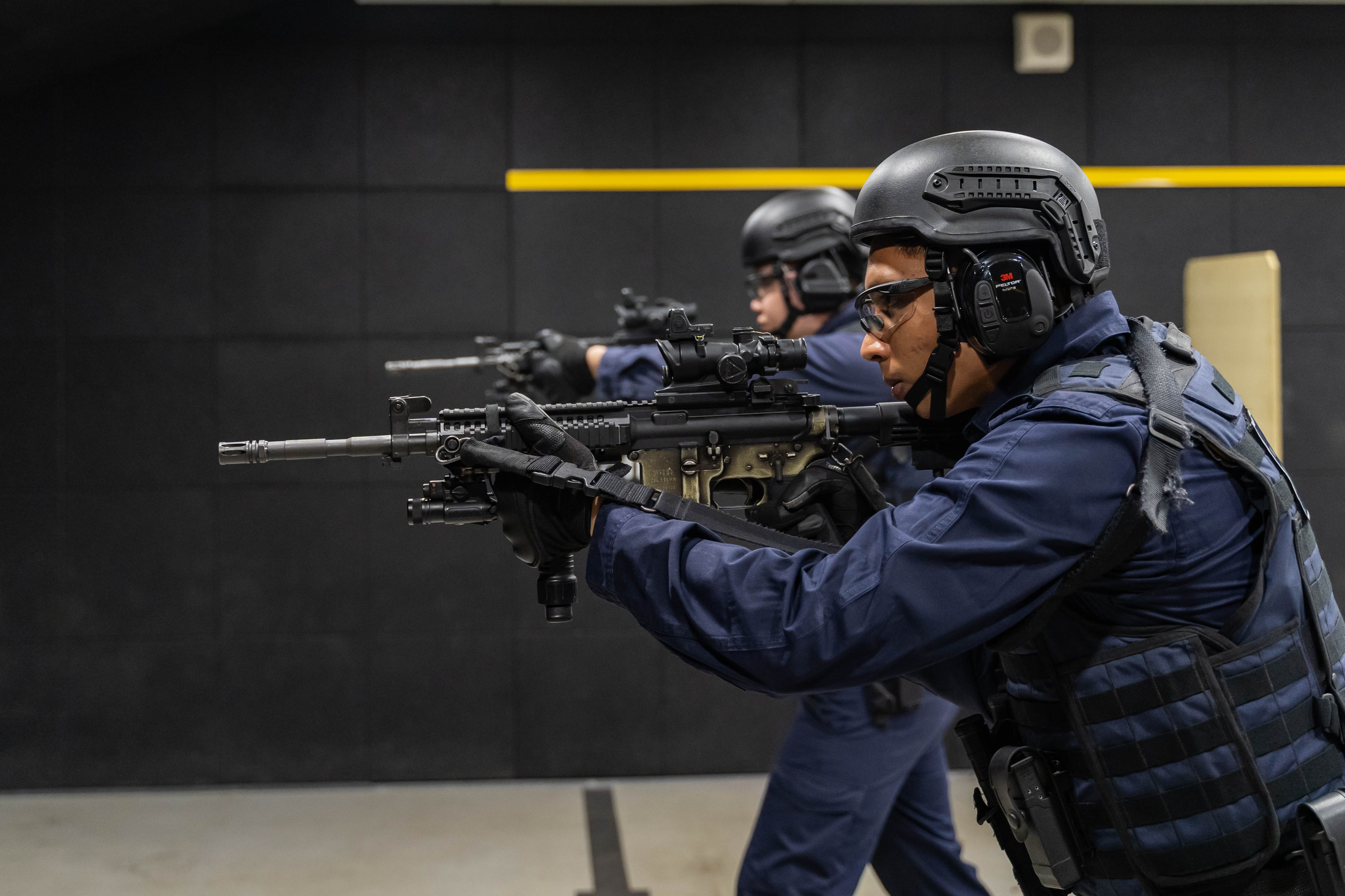 PCG officers demonstrating how to systematically clear a room. PHOTO: Ryan Quek 