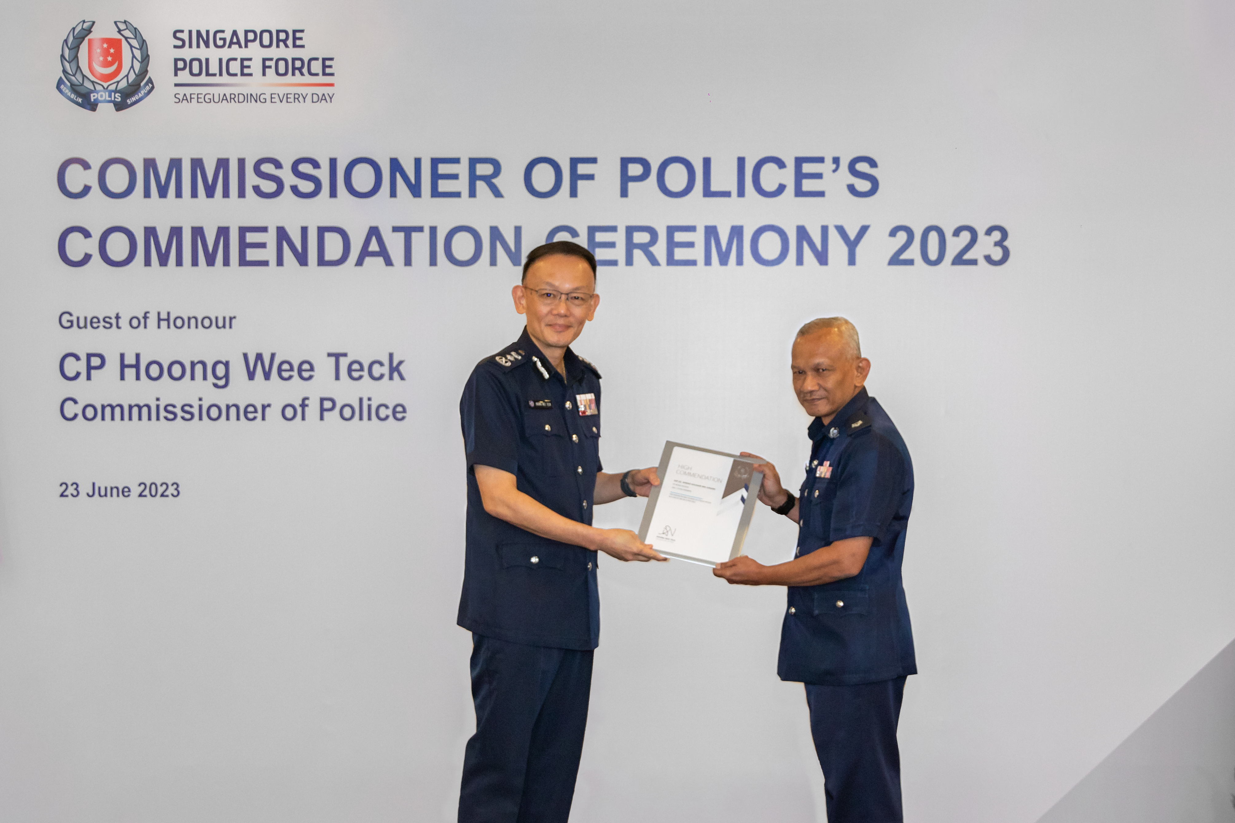 ASP Ahmad receiving the High Commendation Award from CP Hoong Wee Teck. PHOTO: Soh Ying Jie 