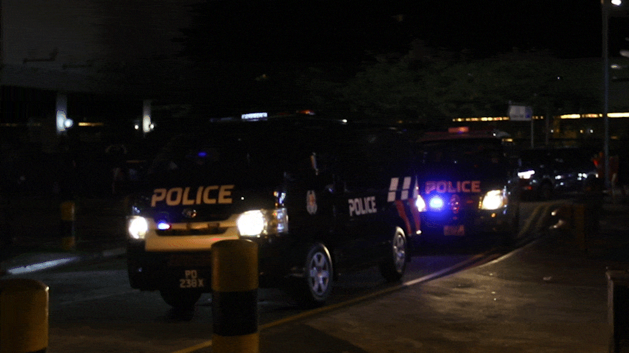 Police vehicles at the scene of the enforcement operation. PHOTO: Soh Ying Jie