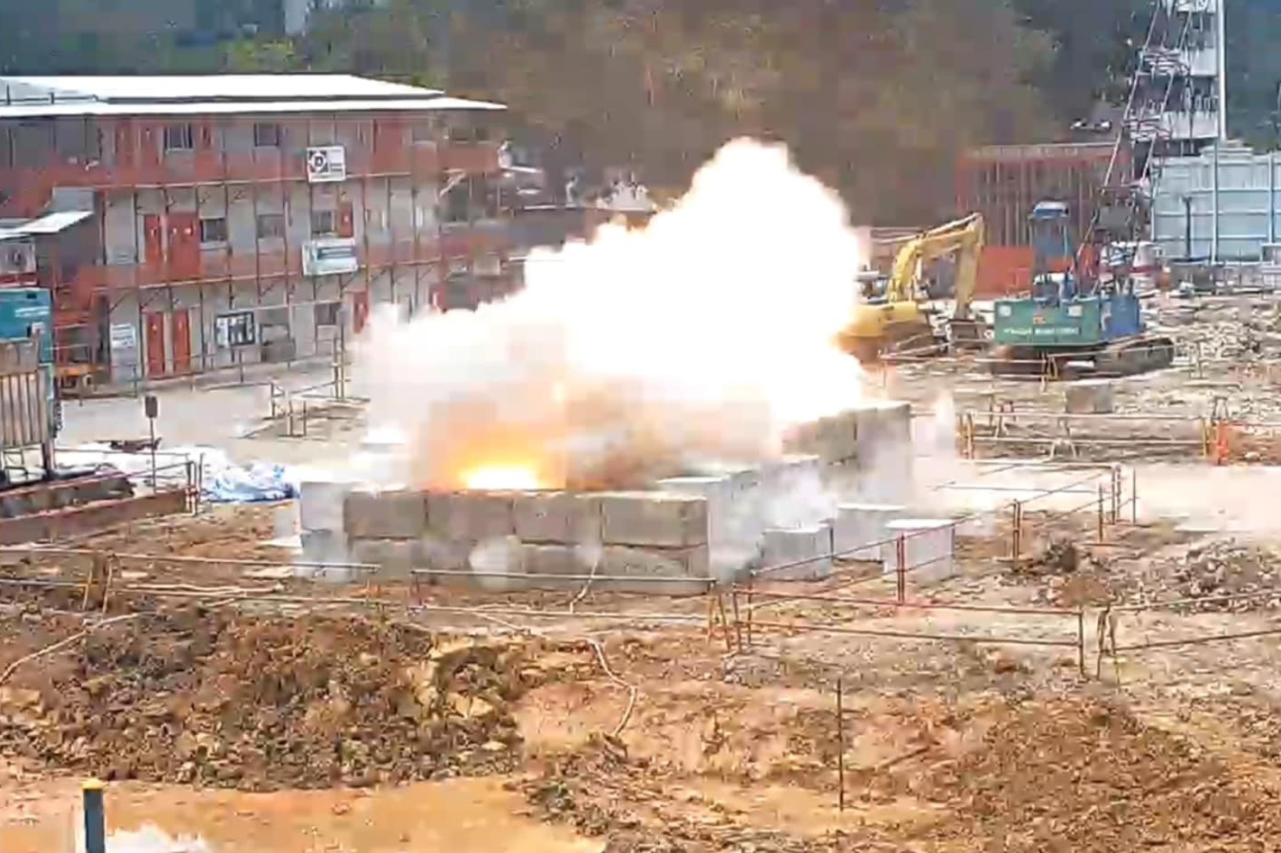 The war relic along Upper Bukit Timah Road exploding on 26 September 2023 at a construction site, the day of the safely scheduled detonation.