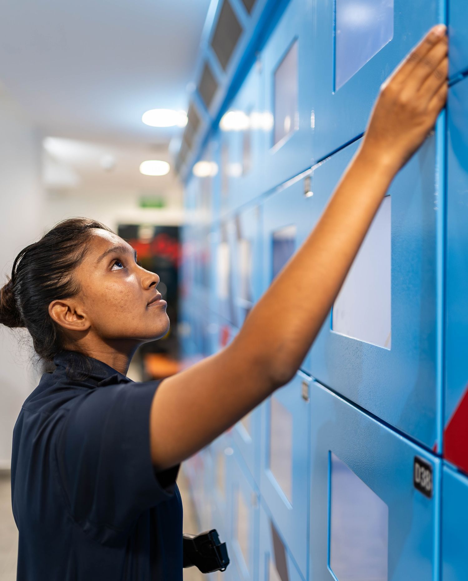 officer withdrawing equipment from the AES lockers