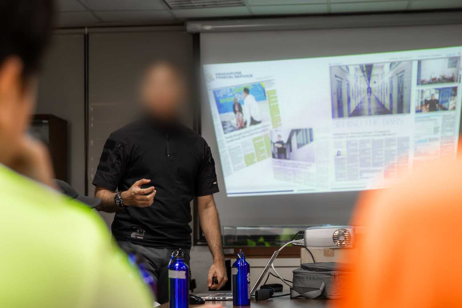 A guest speaker from the Singapore Prison Service explaining the penalties that youths may face if they commit offences.