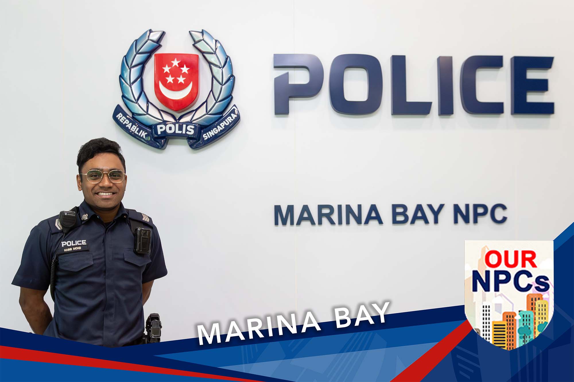 officer standing infront of the NPC signage stating Marina Bay