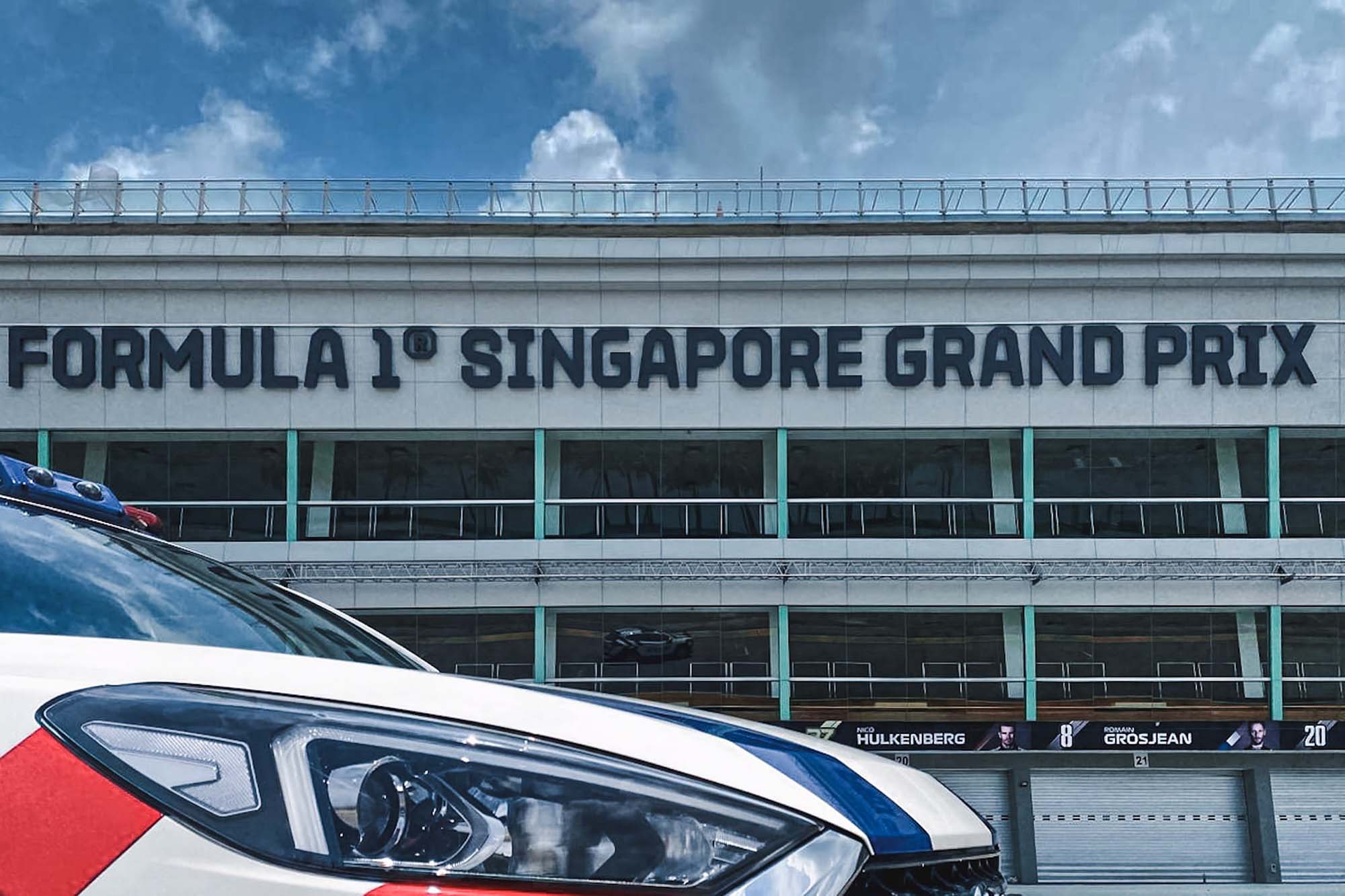 a photo of the NGFRC bonnet with the F1 pit stop building in the background