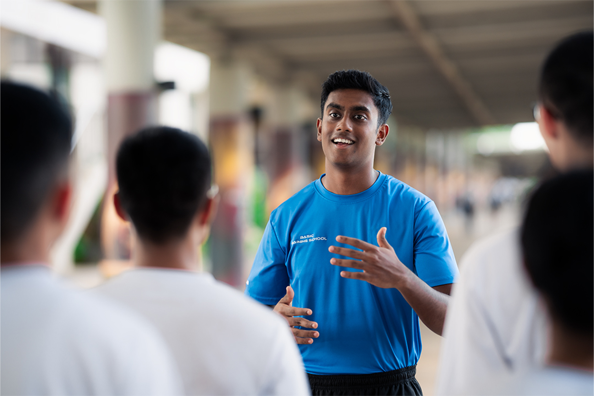 SC/Sgt Jonathan briefing his trainees on the physical training plans for the day. PHOTO: Soh Ying Jie