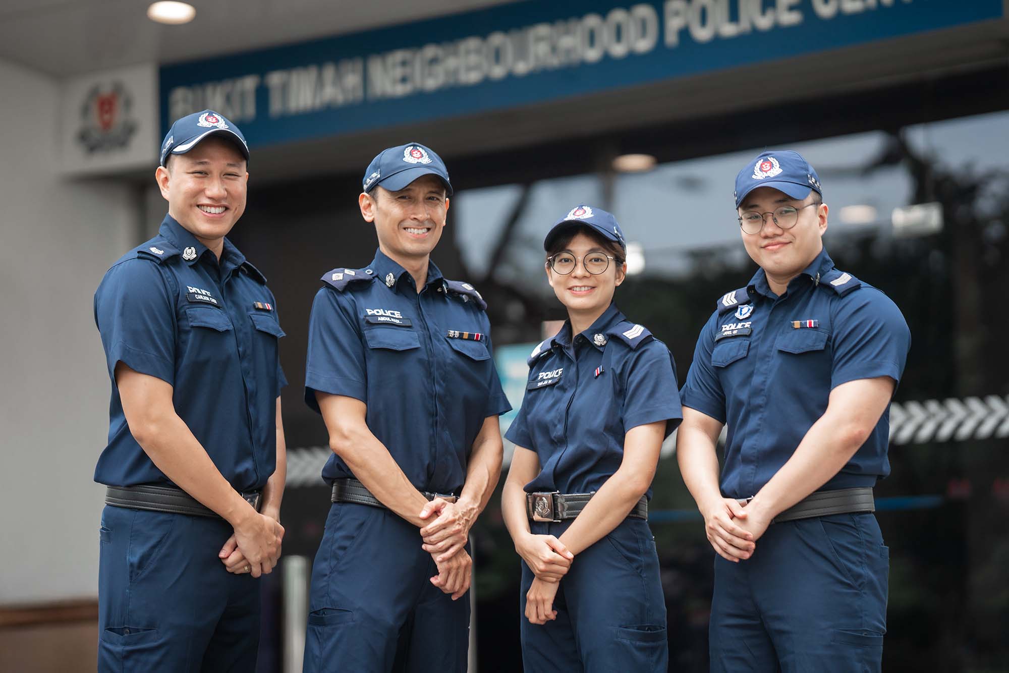 From left: ASP Carlson Chen, Insp Abdul Hadi Bin Halim, Sgt Tan Jia Yi, Sgt Joel Ee from Bukit Timah NPC assisted those injured in an accident at Bukit Timah Road. PHOTOS: Soh Ying Jie