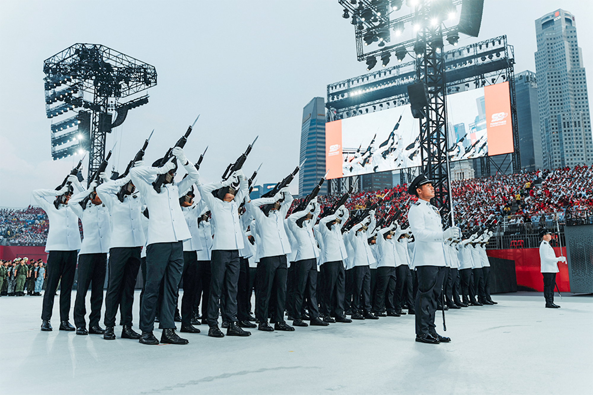 NDP preview: The SPF GOH Contingent performing a Feu de Joi, a French term for a formal, celebratory display of gunfire. PHOTO: Naveen Raj