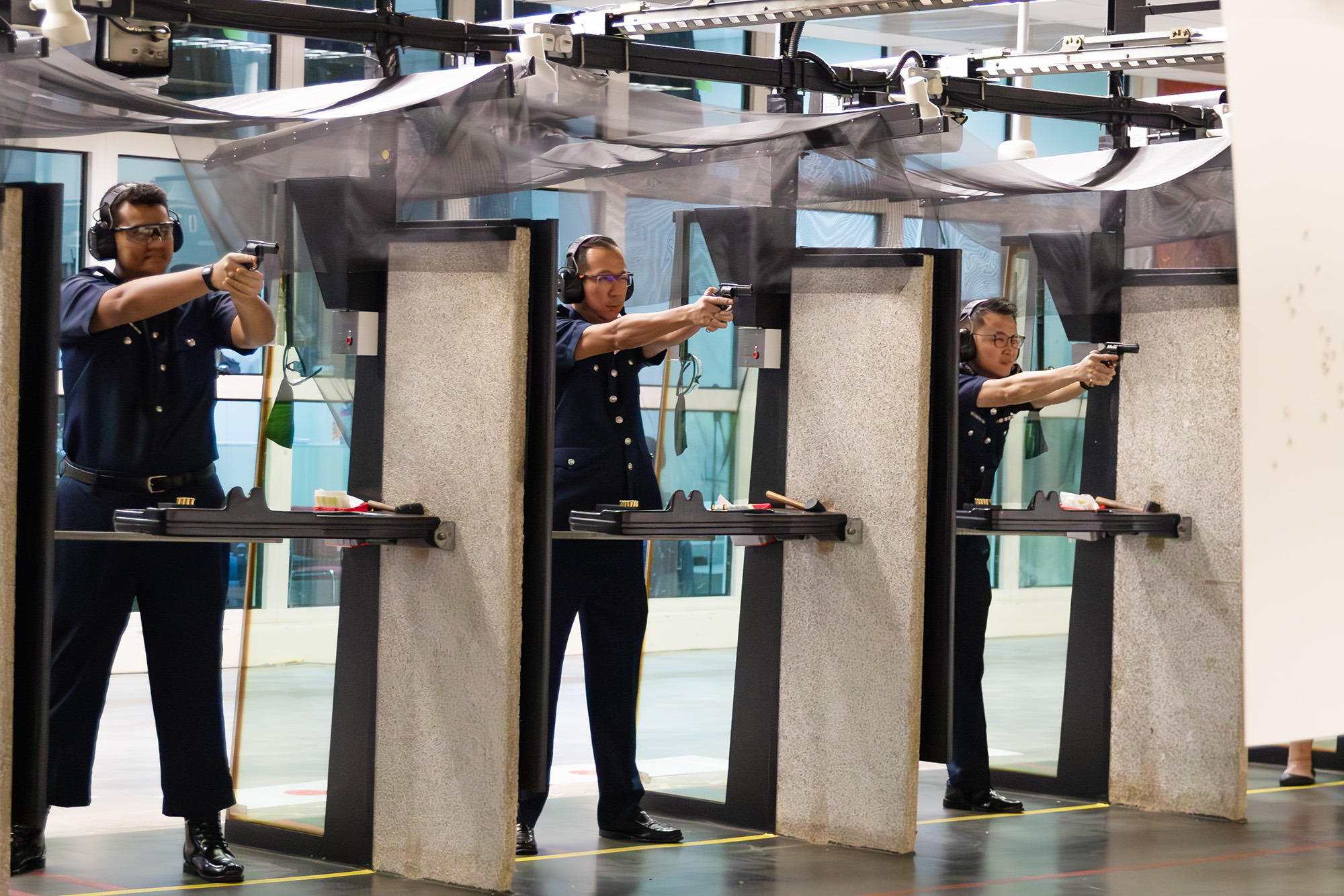 Honorary Officers showcase their exceptional marksmanship during the competition.