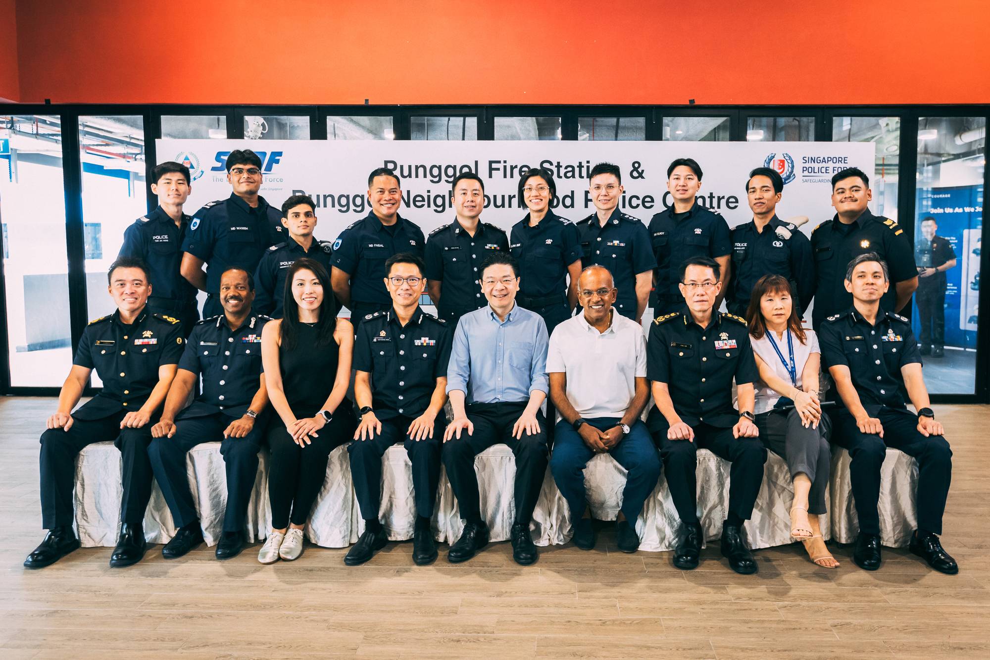 group photo of home team officers sitting facing the camera