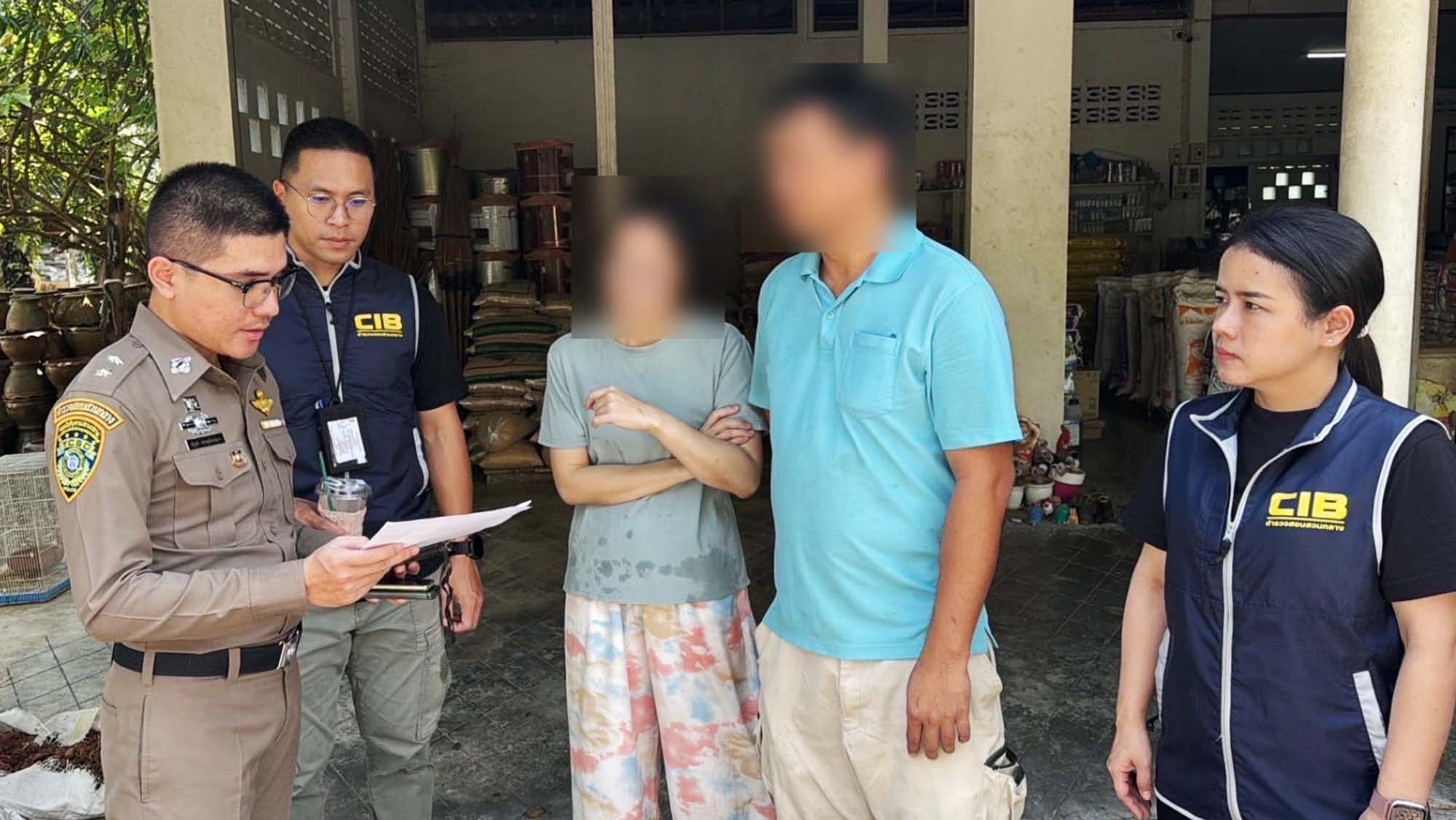 thai police officers interviewing a subject after a csam raid was conducted
