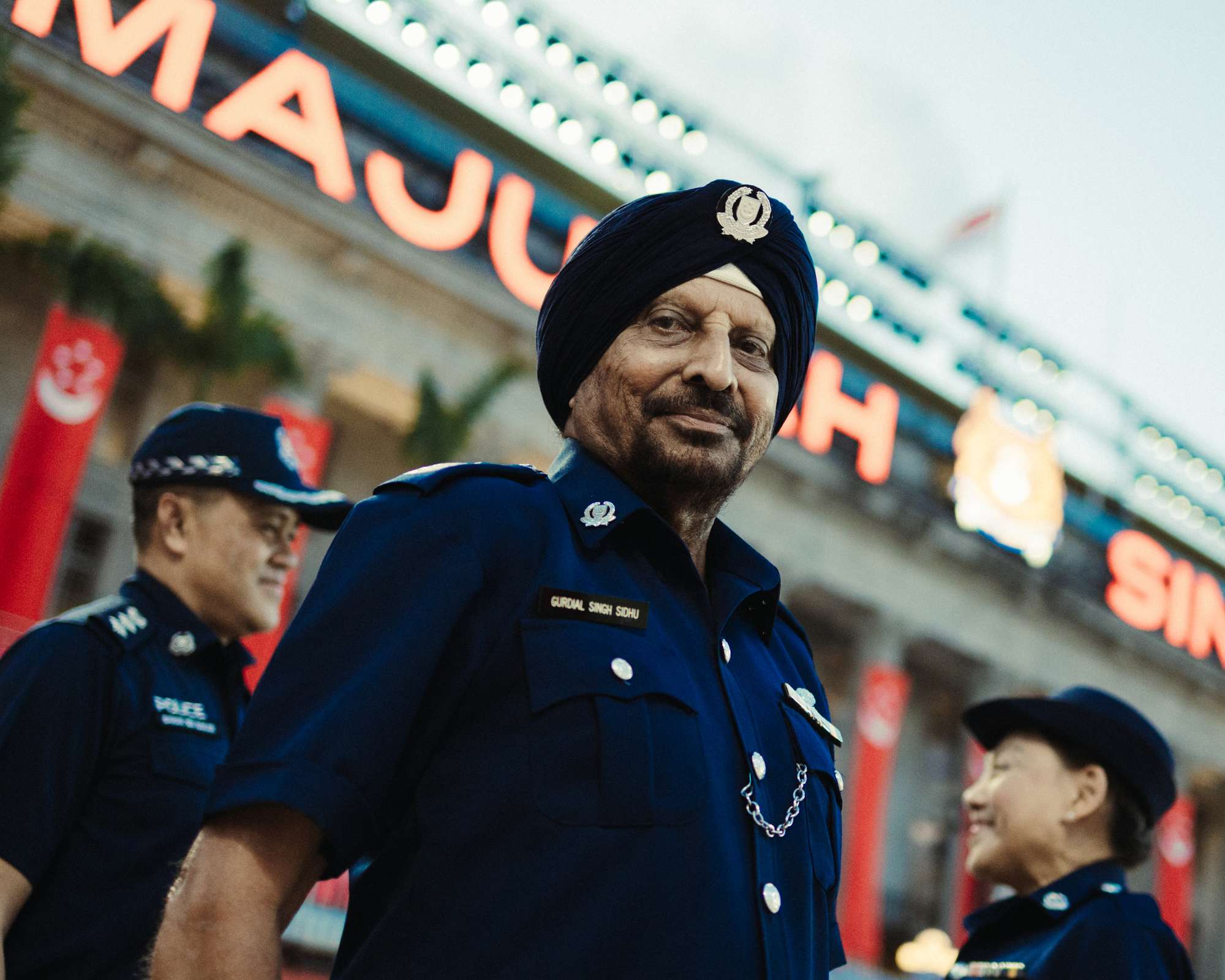 Gurdial in uniform standing infront of the NGS