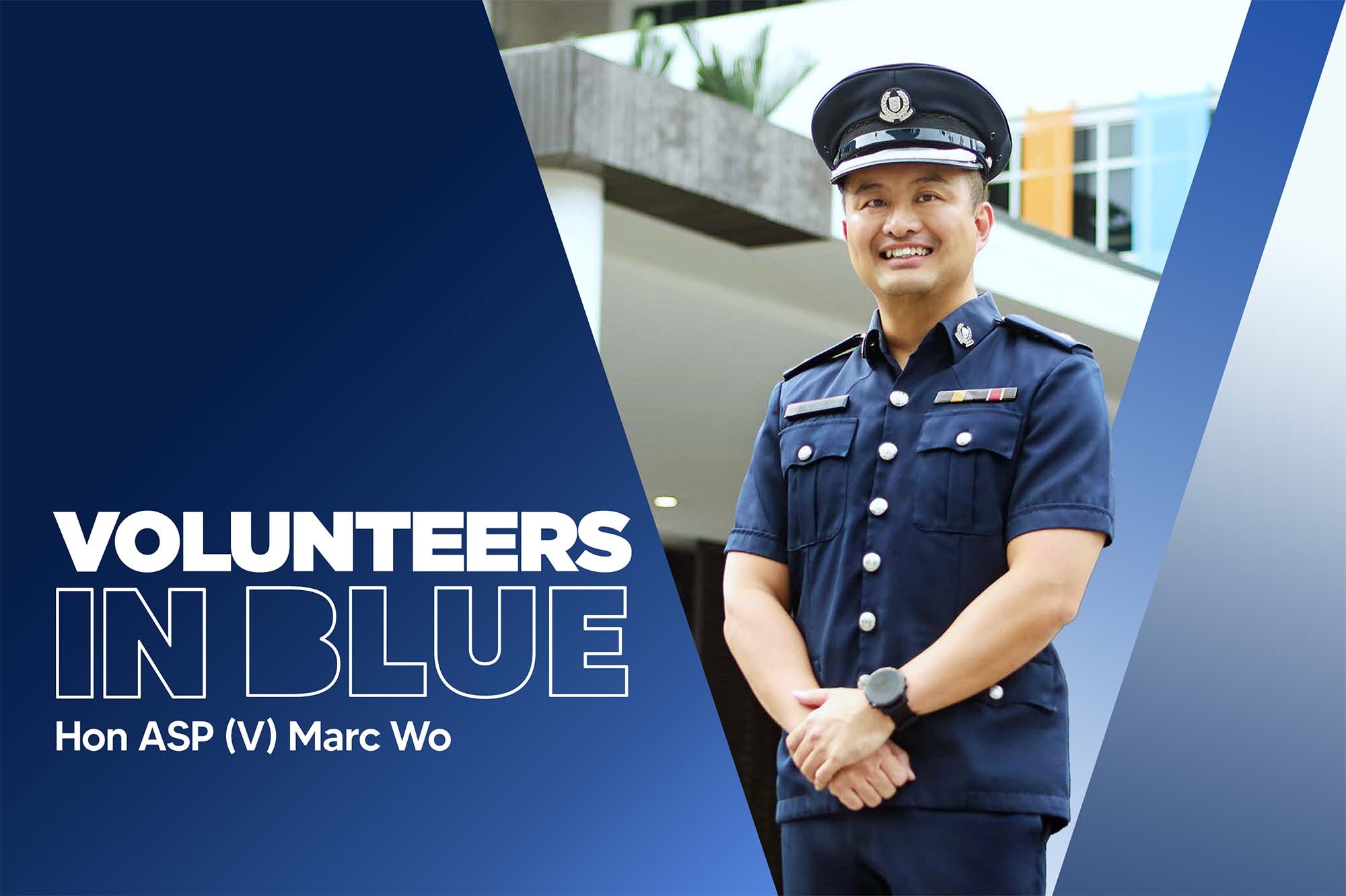 officer marc standing in his uniform and infront of his school with a teaser graphic showing blue and white patterns with the series title in it (Volunteers in blue) and his name