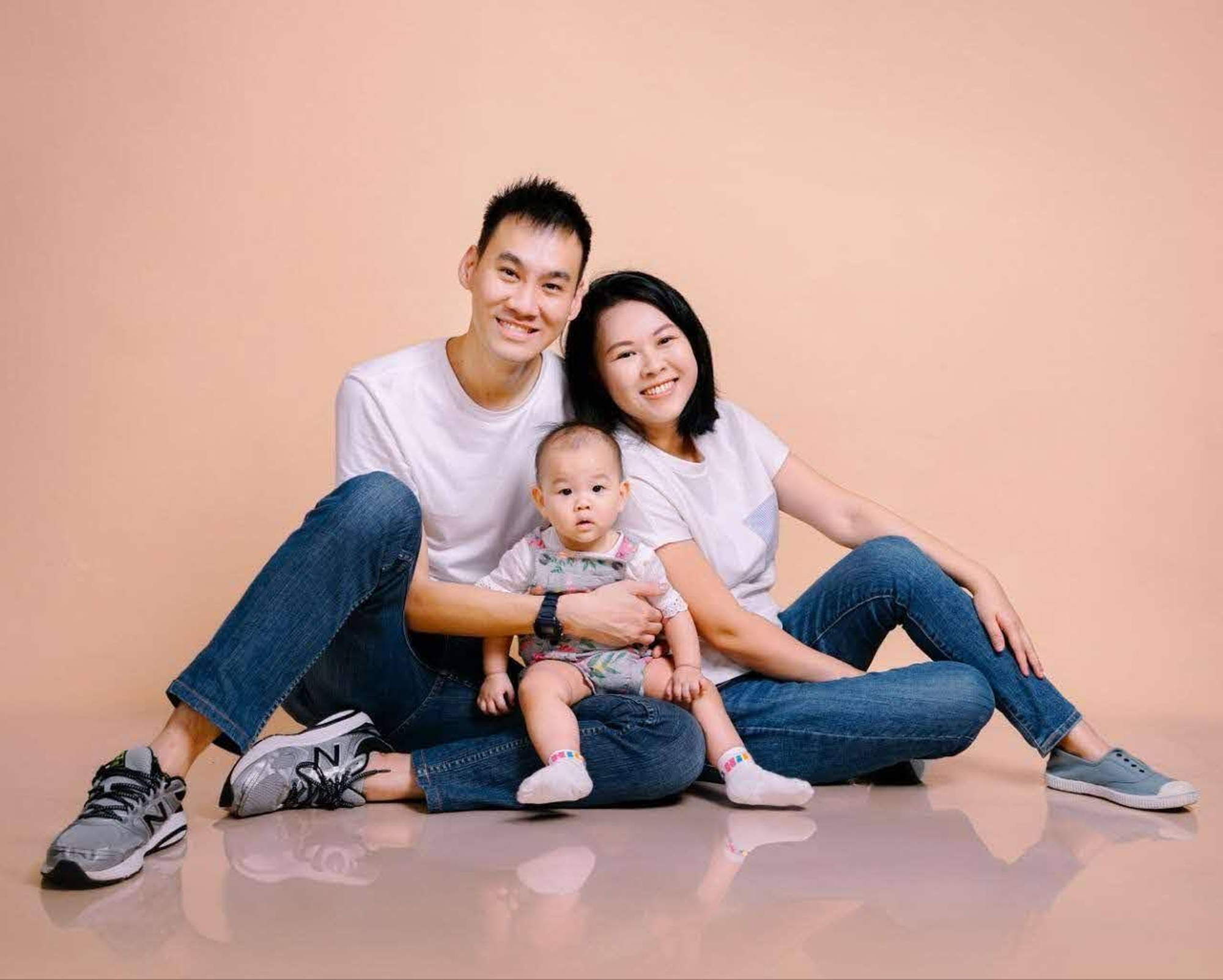 family photo of jason, wife and baby