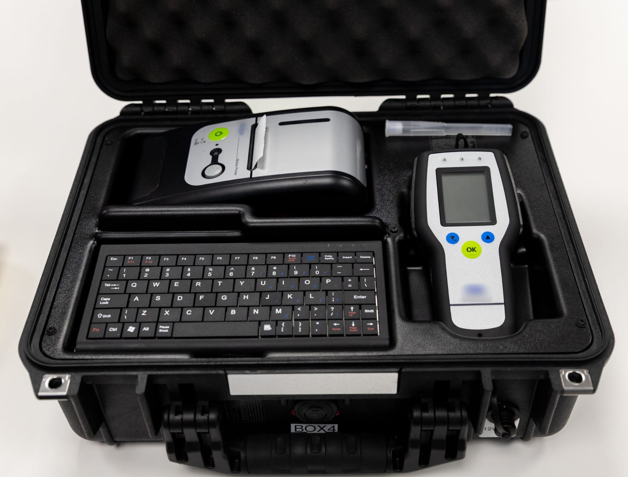 A photo of a padded briefcase containing the portable devices.