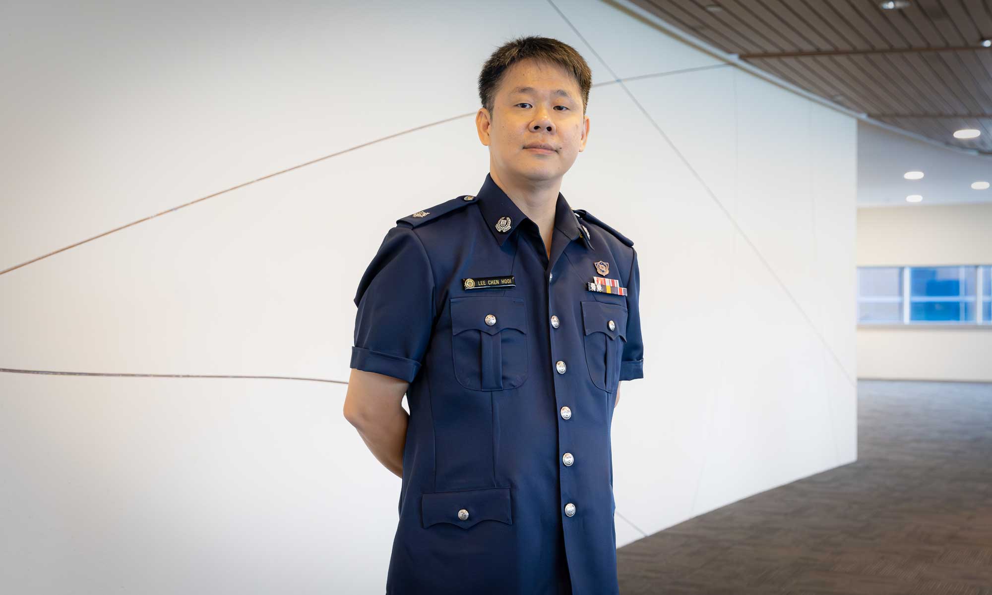 A profile shot of ASP Lee