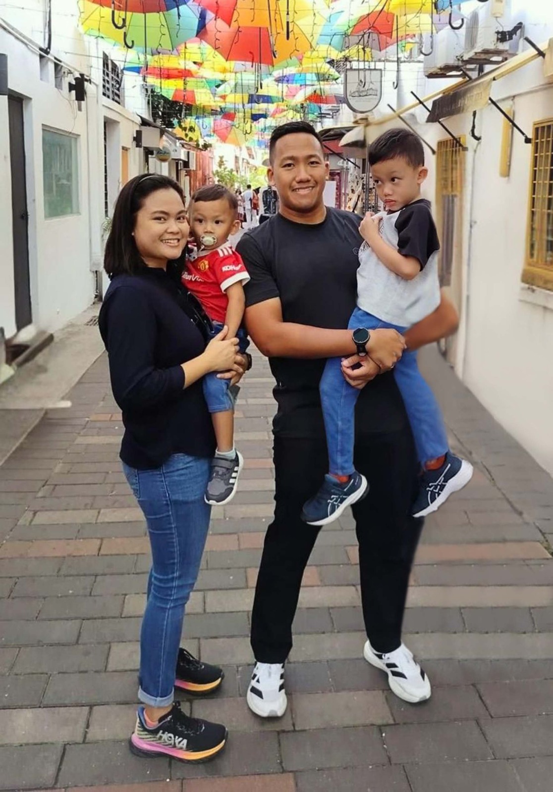 Sgt Aiin and WO Firman with their two sons