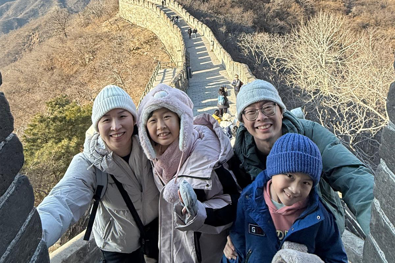 Supt Tay and Supt She with their children.