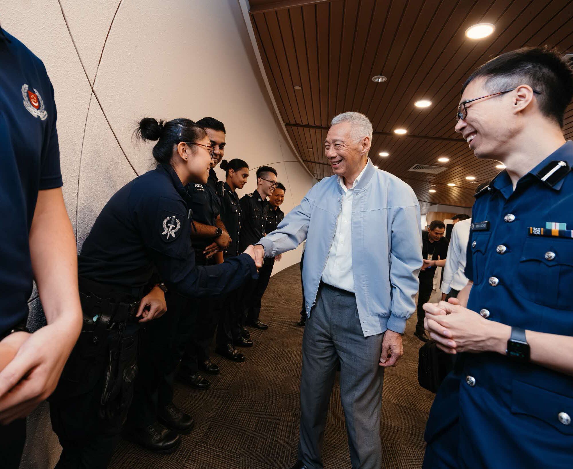 SM Lee greeting officers at the PCC