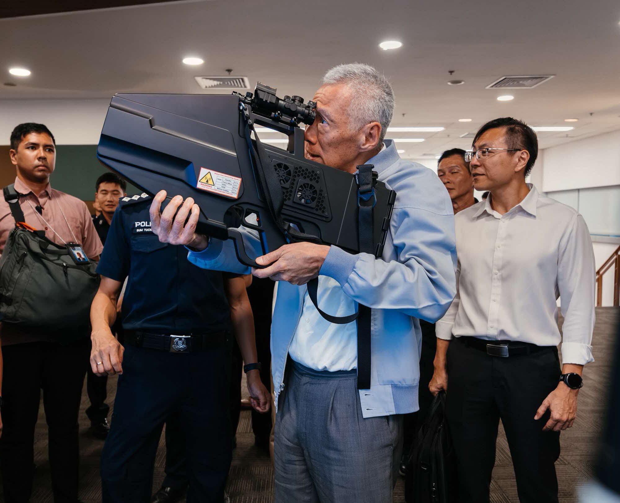 SM Lee handling the drone jammer gun. 