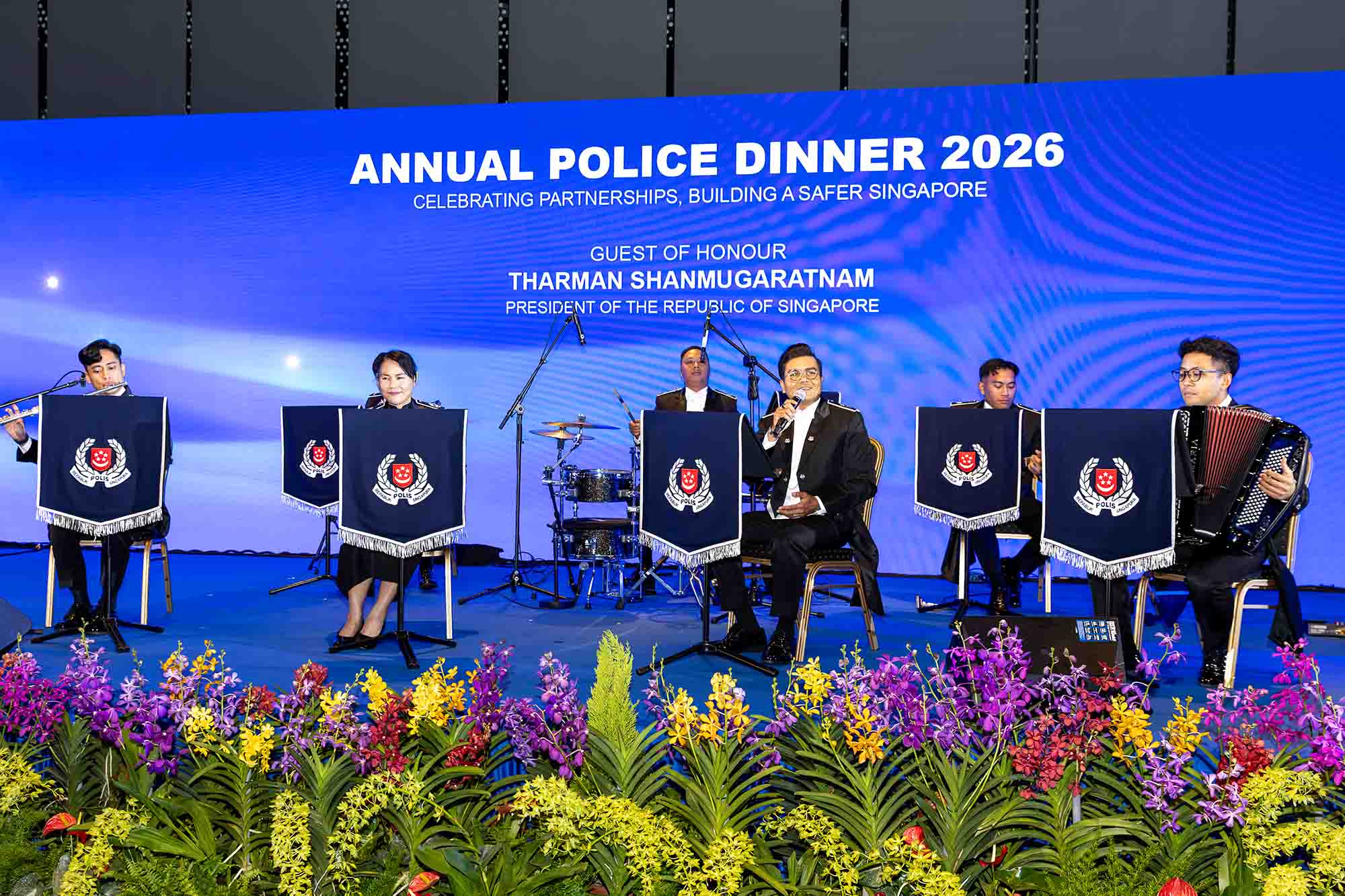 The SPF Band performing on stage. 