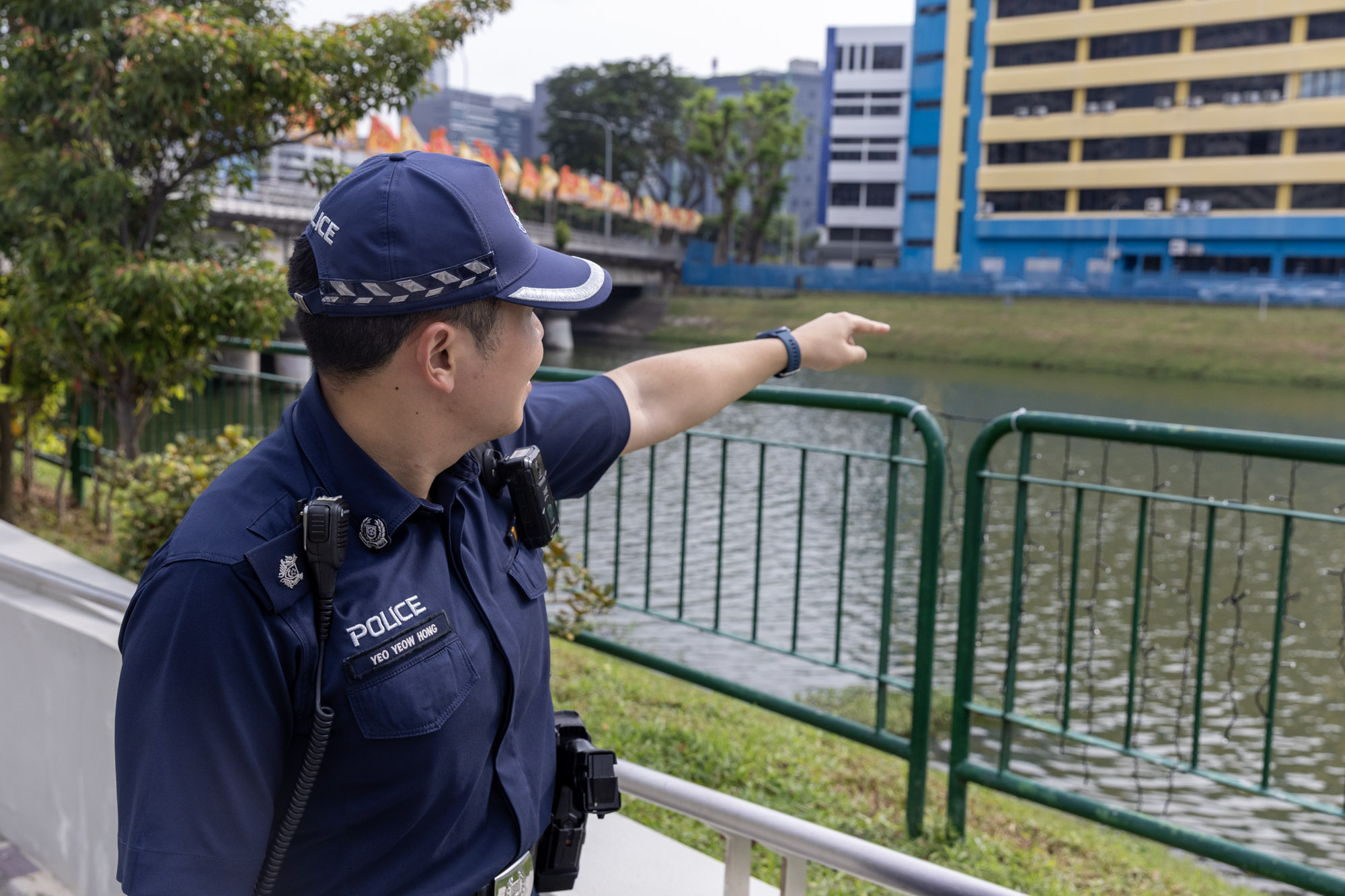 ASP Yeo pointed to the spot where the man was found floating in the Kallang River. PHOTO: Sean Lincoln Mok