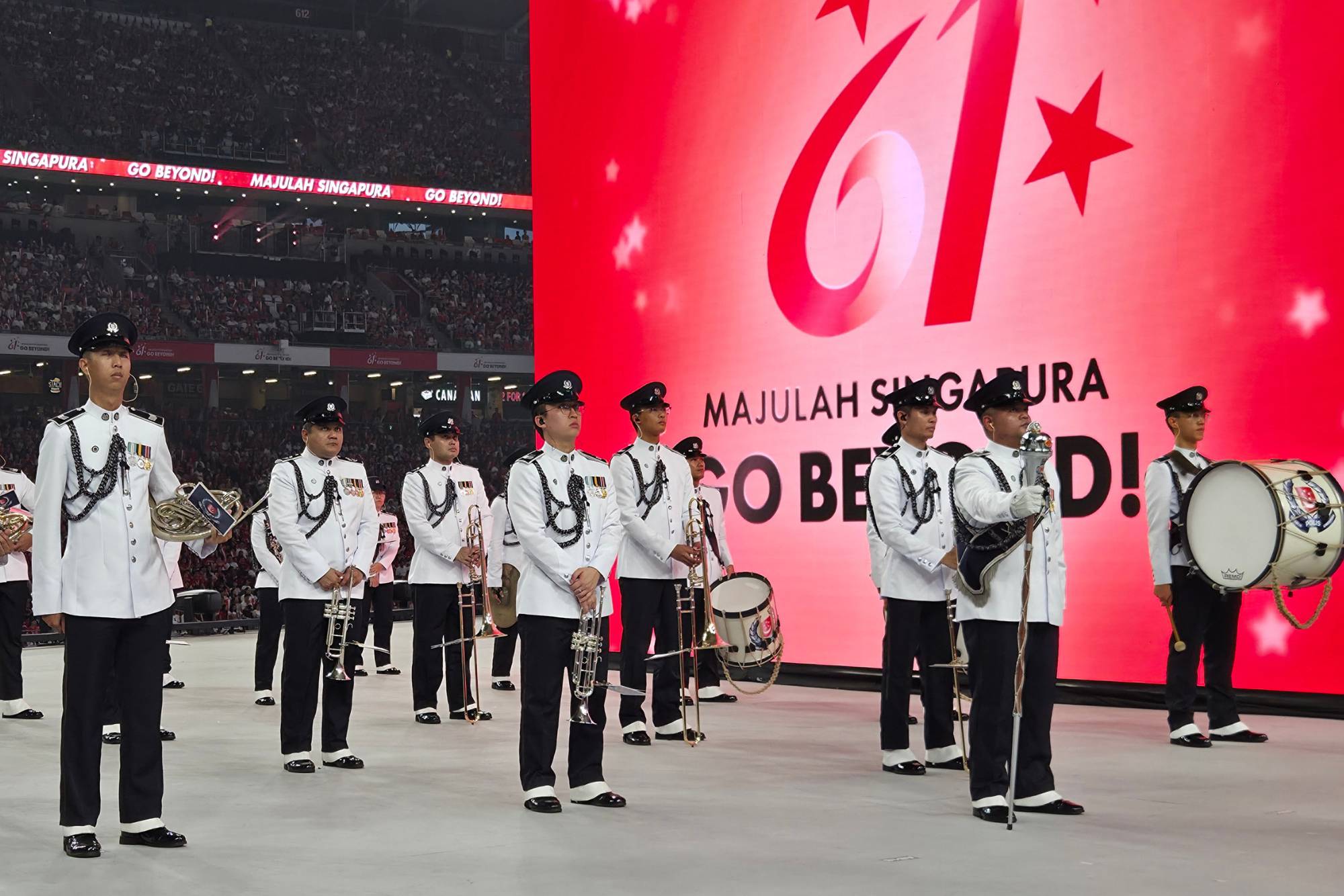 The SPF Band lining up and holding their instruments with pride. 