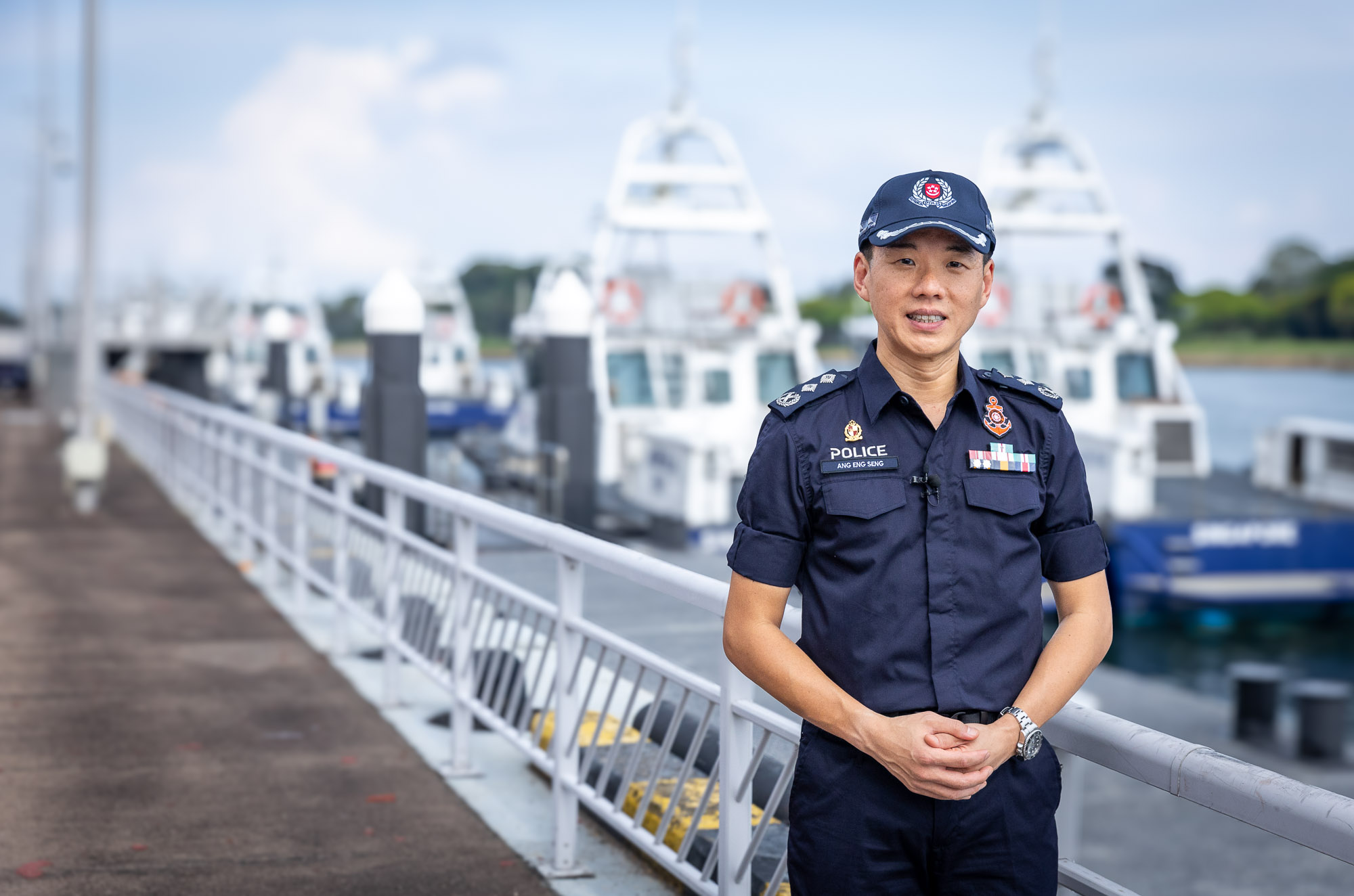 SAC Ang standing by the wharf. 
