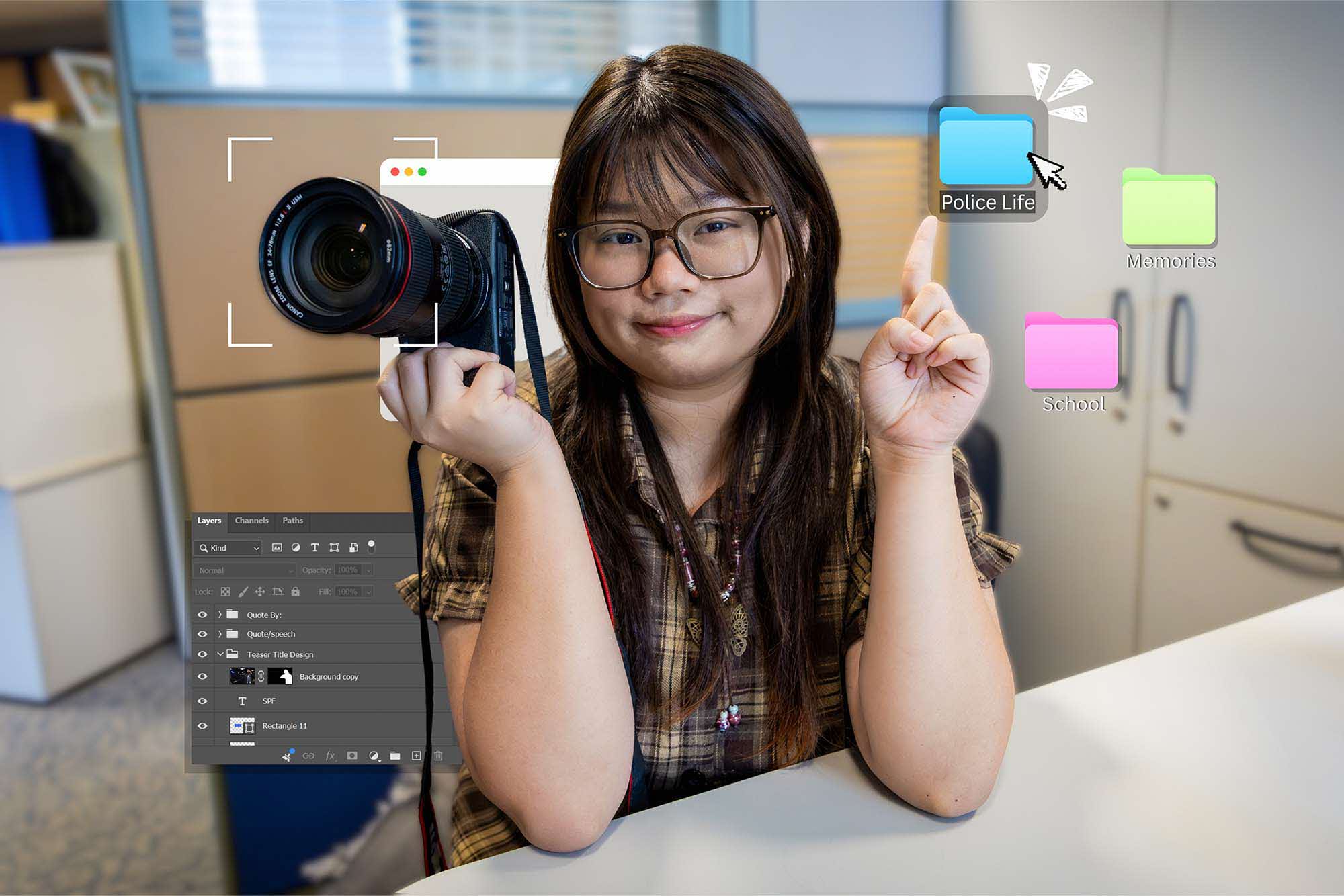 Christal Maung holding a camera in office.