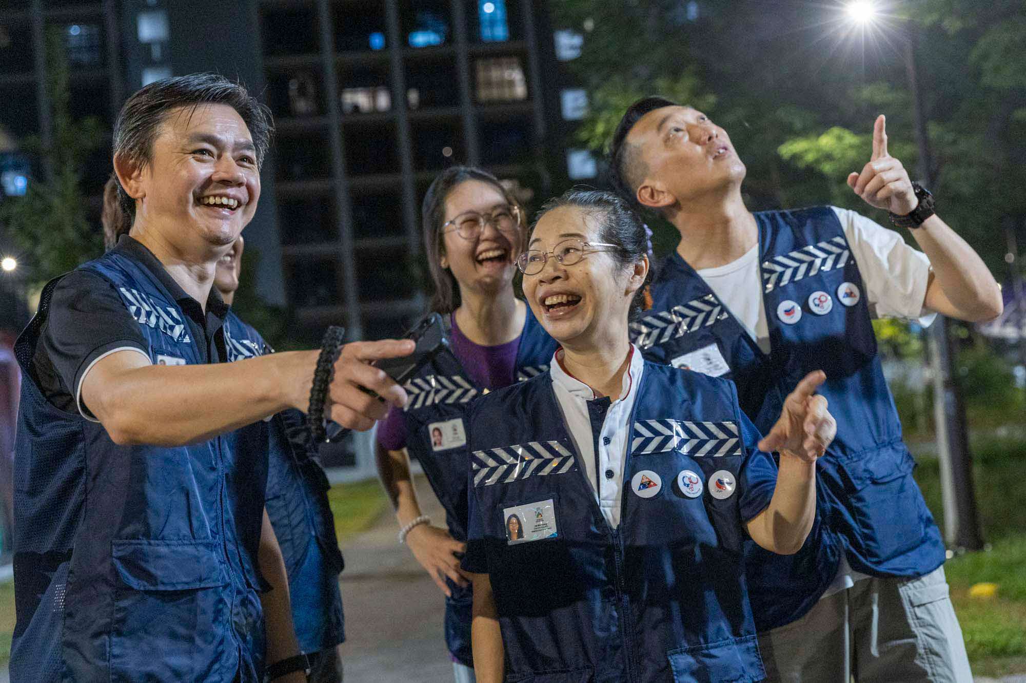 Ms Amy Huang and her fellow COP volunteers.