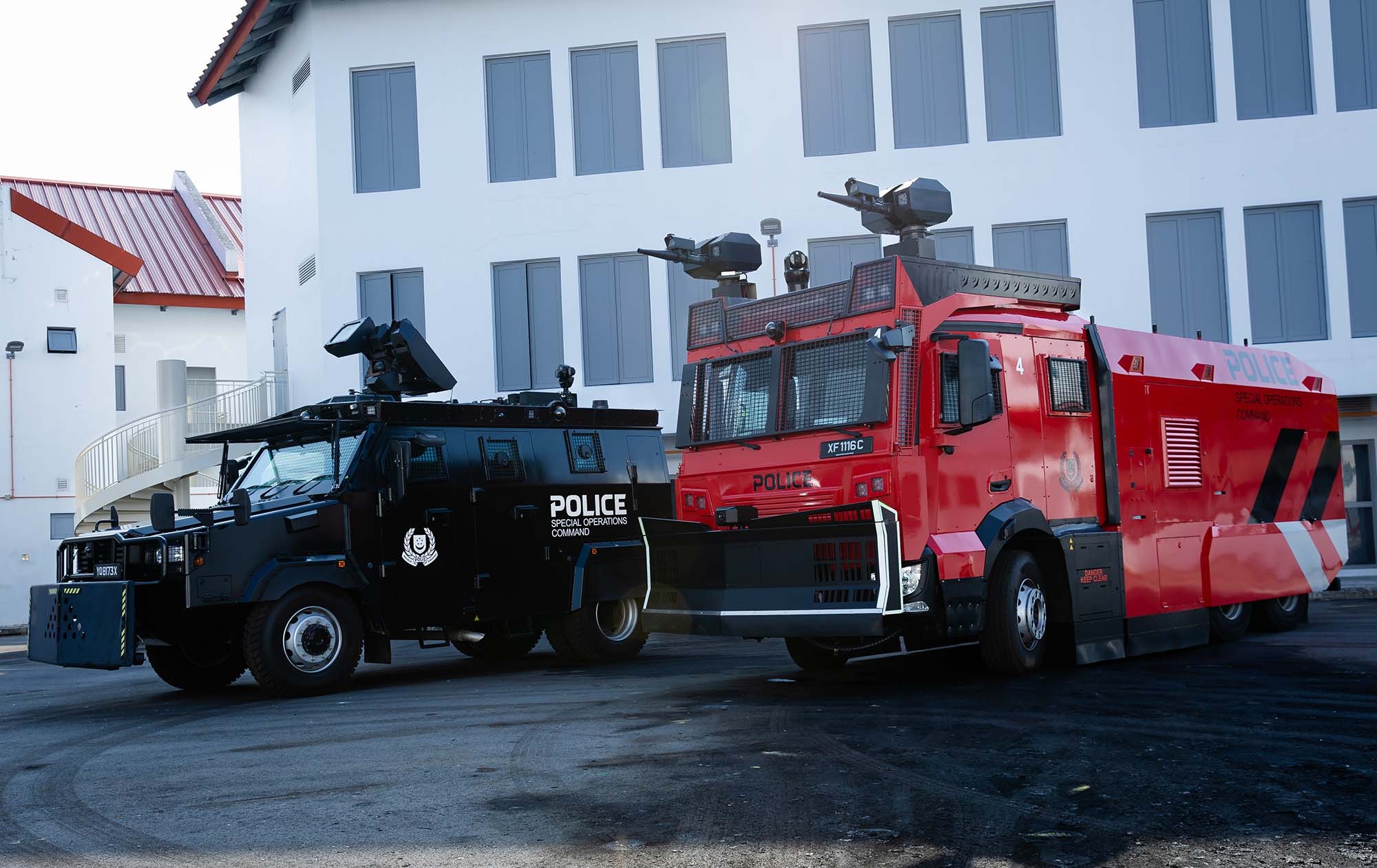 The Next-Generation Water Cannon (right) and the Tactical Strike Vehicle (left).