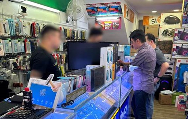 20230406_14_persons_under_invs_for_fraudulently_registering_postpaid_sim_cards_1