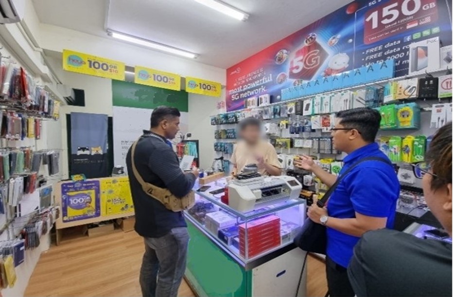 20230406_14_persons_under_invs_for_fraudulently_registering_postpaid_sim_cards_2