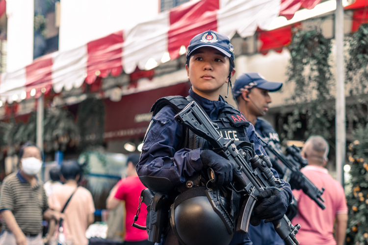 inspector evangeline liew, close up photo of her in uniform