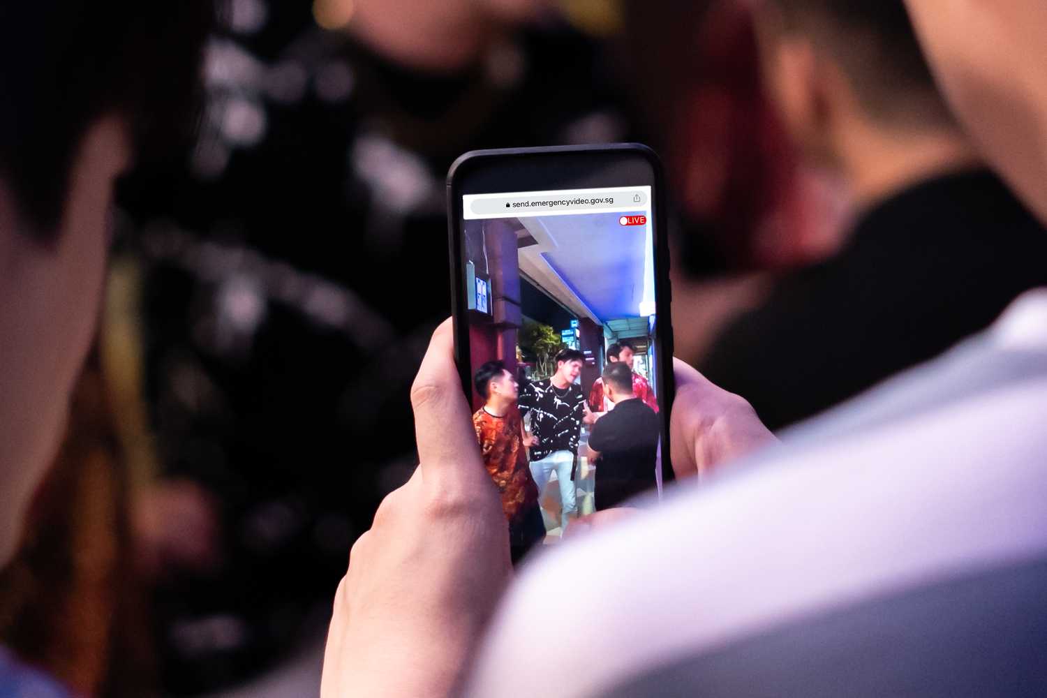 photo screengrab of someone videoing an ongoing fight through his emergency video system 