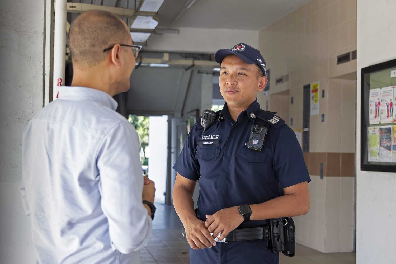 officer talking to a member of public at a voiddeck