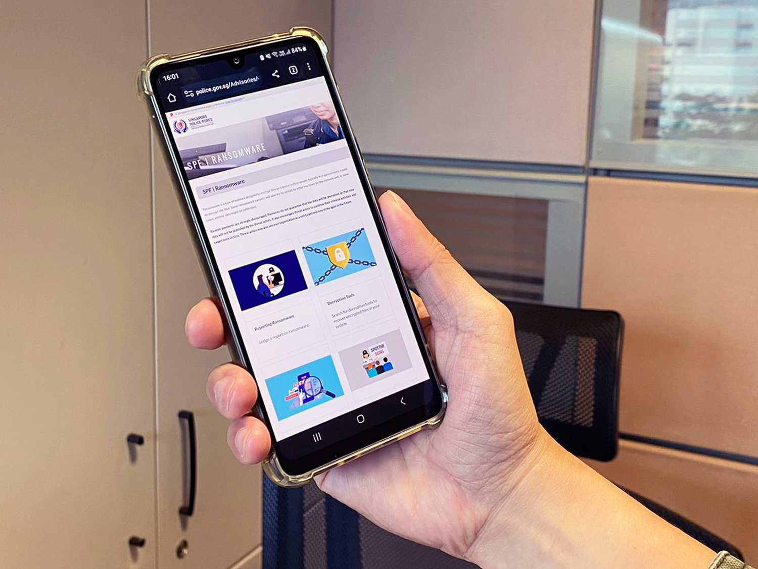 a person holding a phone that is showing a display page on it