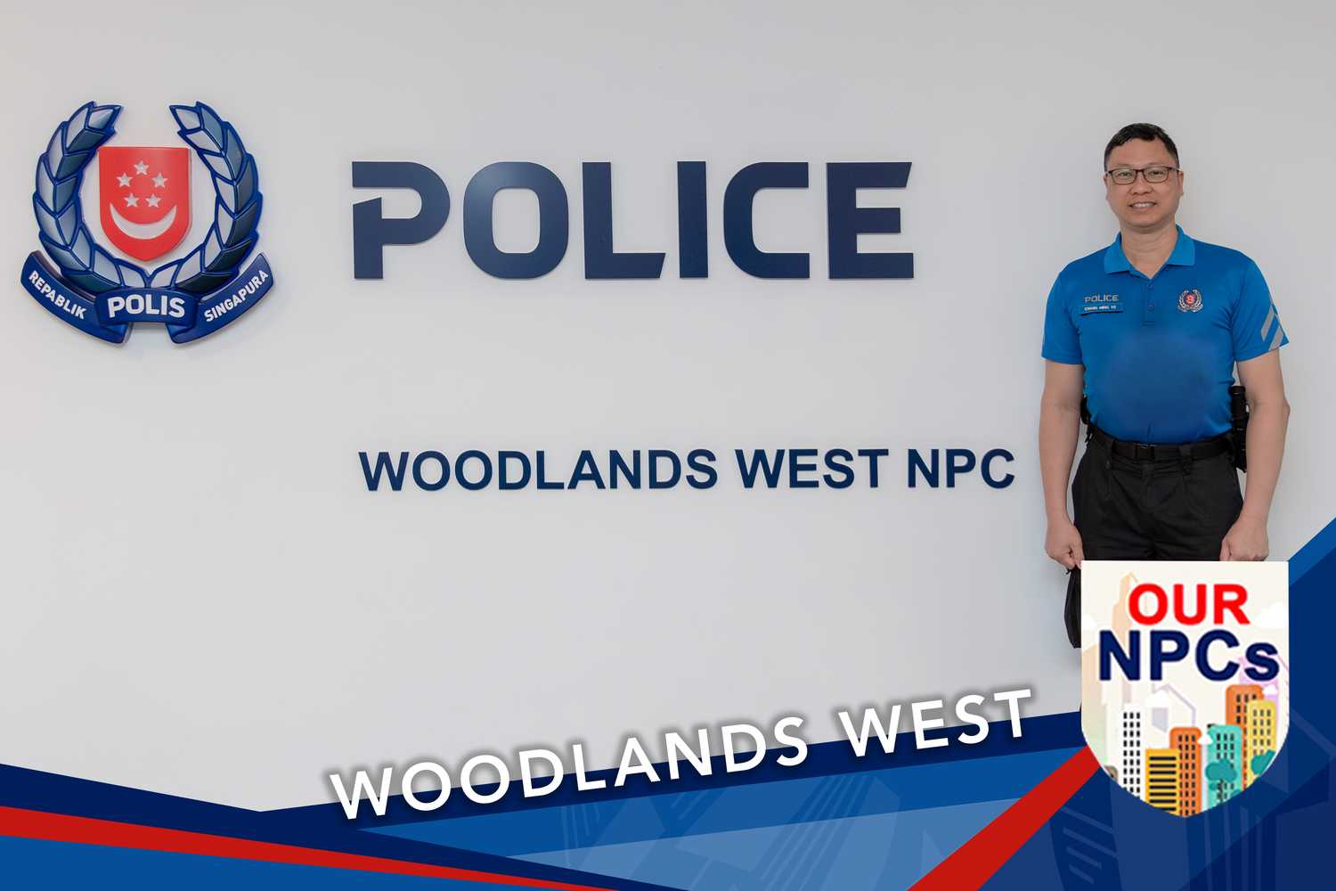 VSCC officer standing infront of the NPC signage wearing a blue polo tee