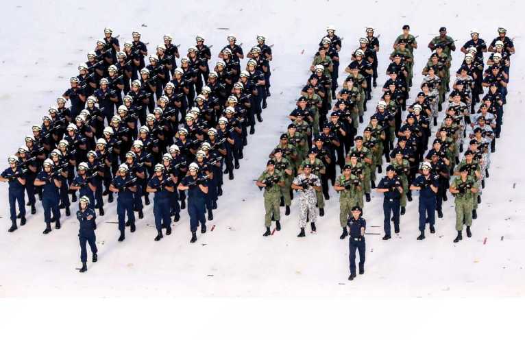 DSP(V) Seah (at bottom left) had the honour of being the Volunteer Contingent Commander during the NDP 2019 Parade.