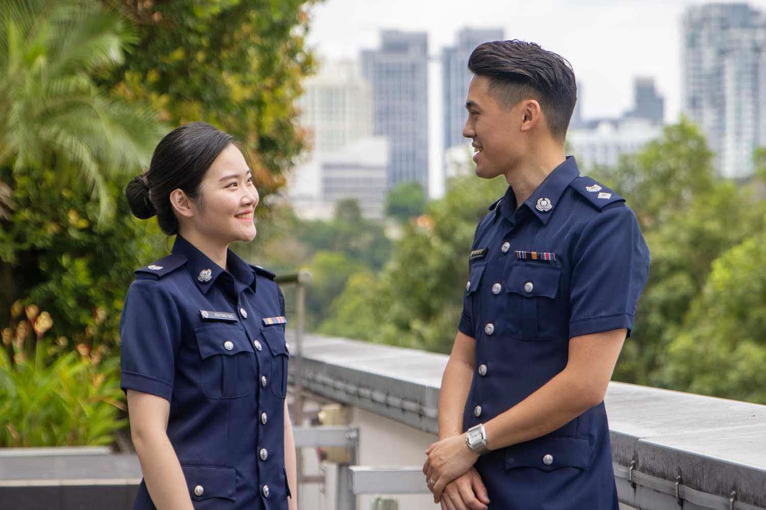 two officers talking to each other at rooftop