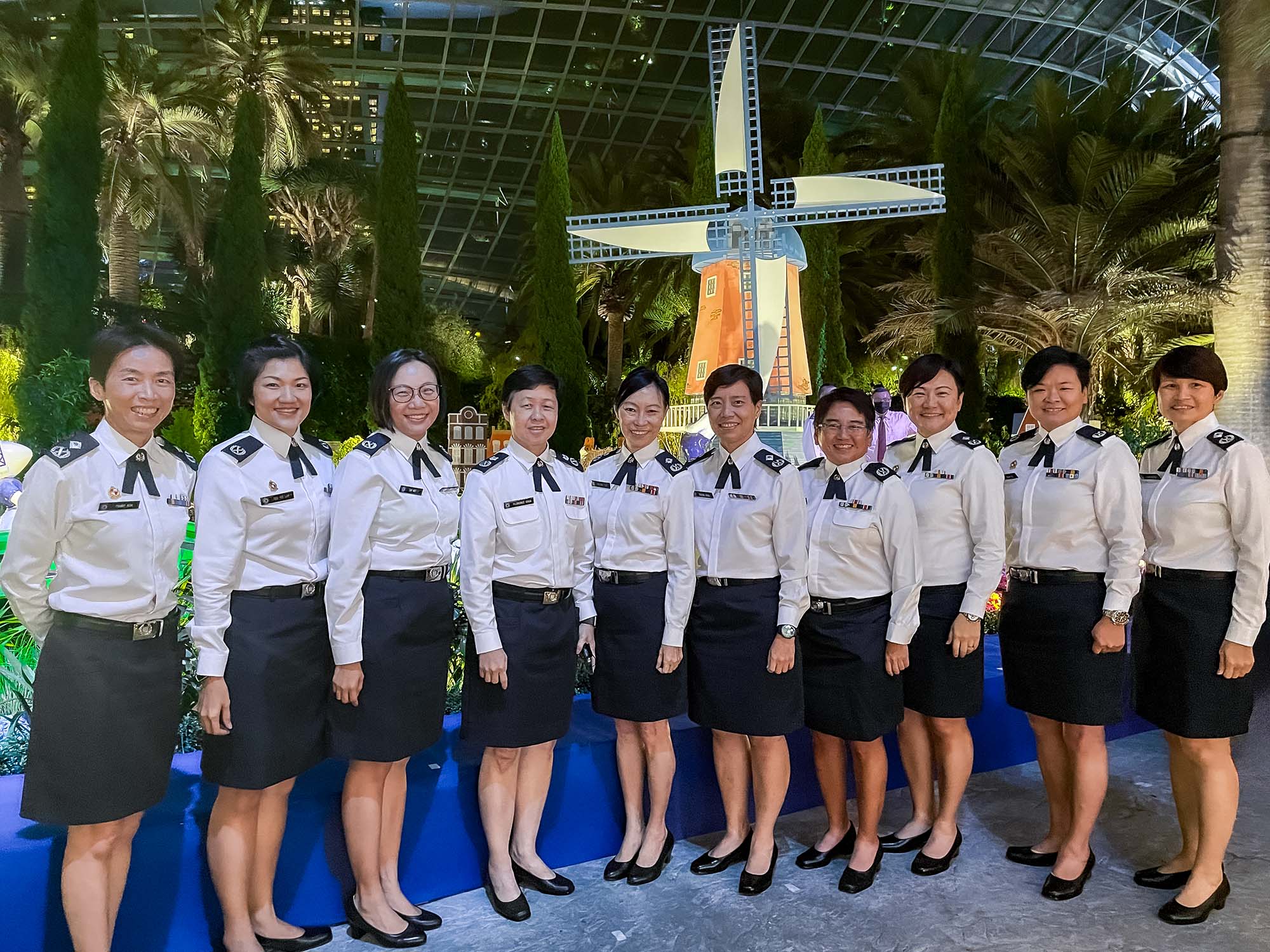 Former DCP Florence Chua (fourth from left) and AC Chiu (fifth from right) with fellow officers at the Police Annual Dinner 2022. PHOTO: SPF