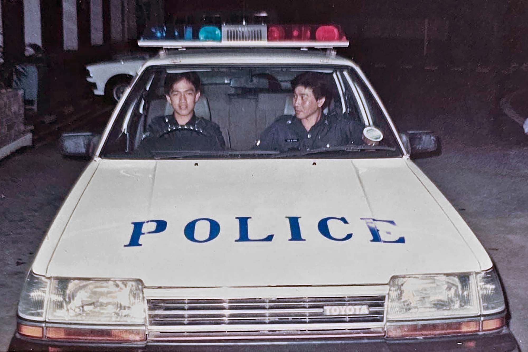 Mr Poh (right) and his fellow officer on patrol at Queenstown Police Division in 1984. PHOTO: Mr Poh Ah Keong