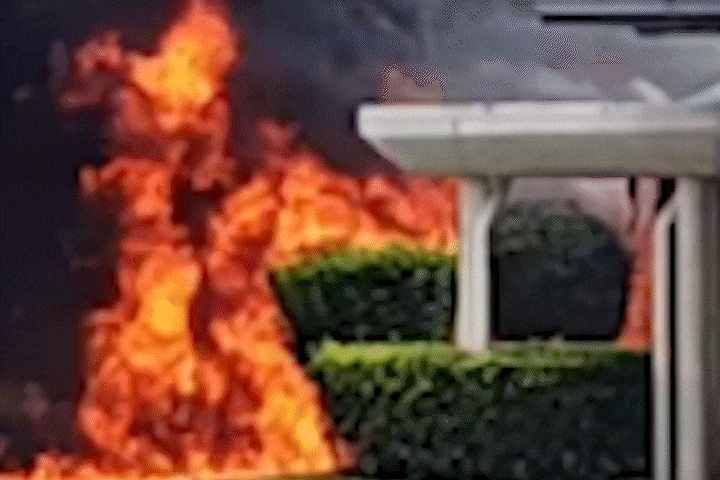 The bus engulfed by raging flames. GIF: Soh Ying Jie