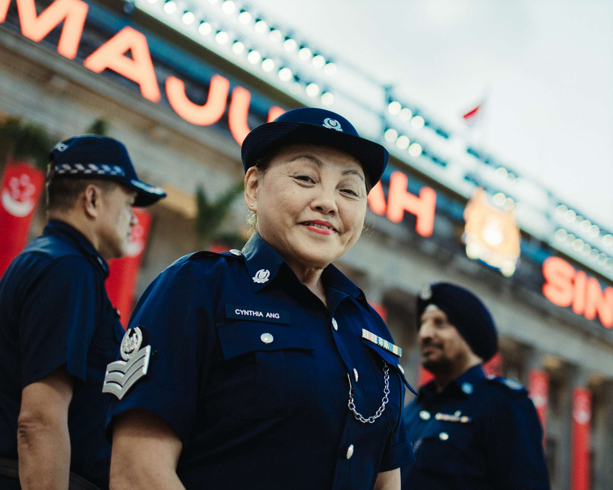 cynthia in uniform, focused and standing infront of the NGS